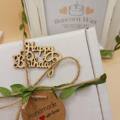 Gift box with 'Happy Birthday' wooden tag and 'Handmade with Love' tag, featuring Runcorn Wax in the background.