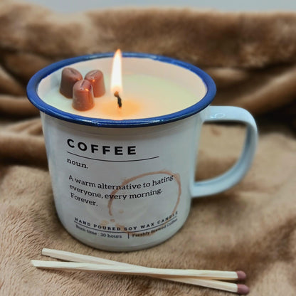 Candle in a mug labeled 'COFFEE' with matches on a soft fabric background coffee lover obsessed caffeine her him present