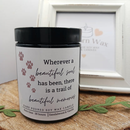 Candle with a motivational quote on a wooden surface, with 'runcorn Wax' branding in the background. pet bereavement memorial loss