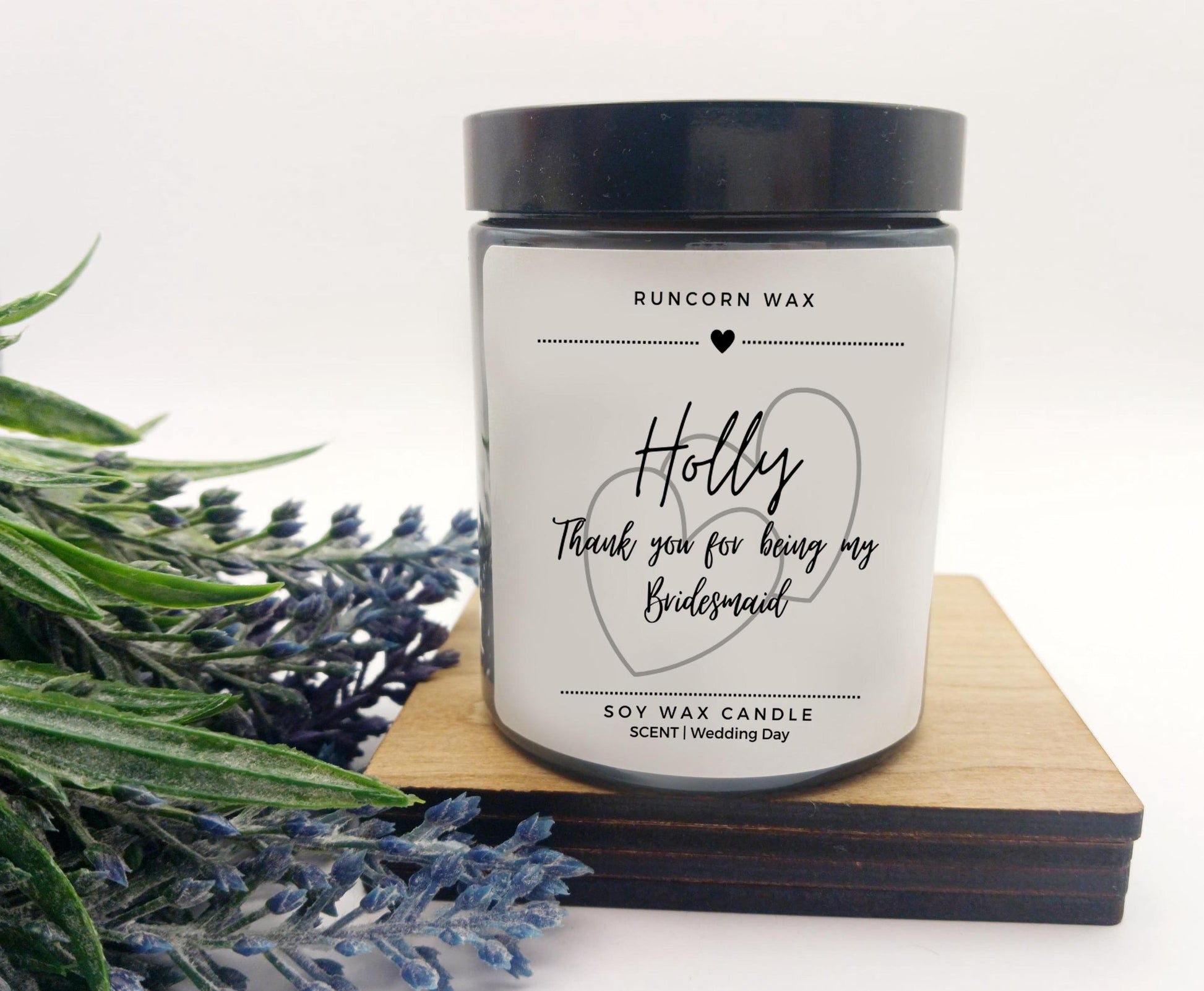 Candle with personalized message on a white background bridesmaid thank you