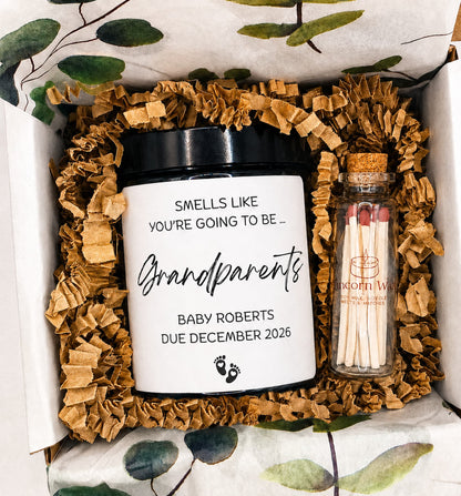 Personalised auntie pregnancy announcement candle in amber glass jar, in a candle gift box with eco friendly filling and jar of matches. eucalyptus themed tissue paper present 