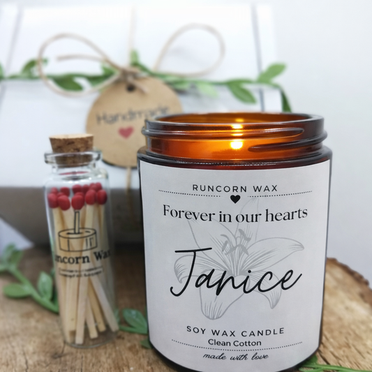 Candle with 'Runcorn Wax' branding and a small bottle of matches on a wooden surface. bereavement loss remembrance keepsake death family thoughtful