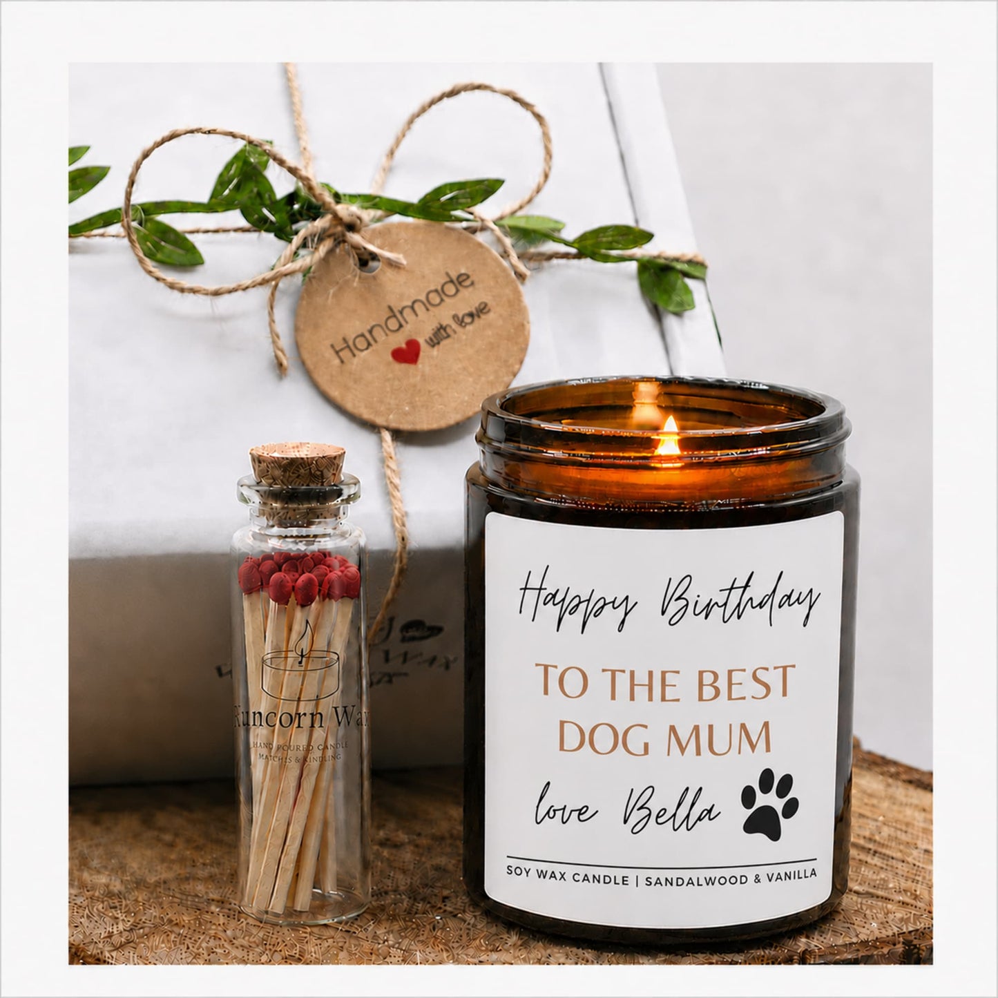 Candle with a personalized label, small bottle of matches, and decorative tag on a white background happy birthday dog mum paw print Personalised dog mum birthday candle in amber glass jar, featuring “Happy Birthday to the Best Dog Mum” message with custom name and paw print design. Luxury soy wax candle gift for dog lovers, pet mums, birthday celebrations, and dog owner gifts, displayed in a cosy home setting with warm candlelight.